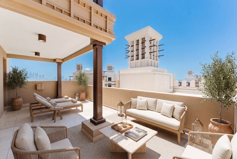 Beachfront residence terrace with traditional architectural details